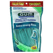 https://images.heb.com/is/image/HEBGrocery/prd-small/gum-eez-thru-extra-strong-mint-flossers-value-bag-001462585.jpg