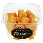 https://images.heb.com/is/image/HEBGrocery/prd-small/h-e-b-artisan-yellow-cheddar-cheese-cubes-001663634.jpg