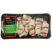 https://images.heb.com/is/image/HEBGrocery/prd-small/h-e-b-bacon-wrapped-shrimp-poppers-with-monterey-jack-cheese-and-jalapeno-002306024.jpg