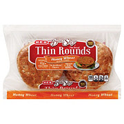 https://images.heb.com/is/image/HEBGrocery/prd-small/h-e-b-bake-shop-honey-wheat-thin-style-rounds-001935566.jpg