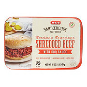 https://images.heb.com/is/image/HEBGrocery/prd-small/h-e-b-fully-cooked-smoked-seasoned-shredded-beef-with-bbq-sauce-000312926.jpg