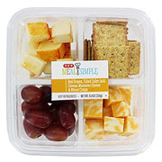 https://images.heb.com/is/image/HEBGrocery/prd-small/h-e-b-meal-simple-cheese-wheat-crisps-and-grapes-snack-tray-003266512.jpg