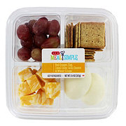 https://images.heb.com/is/image/HEBGrocery/prd-small/h-e-b-meal-simple-eggs-cheese-wheat-crisps-and-grapes-snack-tray-003266534.jpg