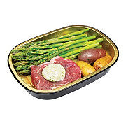 https://images.heb.com/is/image/HEBGrocery/prd-small/h-e-b-meal-simple-garlic-butter-usda-prime-strip-steak-with-asparagus-and-potatoes-002156930.jpg