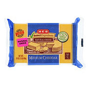 https://images.heb.com/is/image/HEBGrocery/prd-small/h-e-b-select-ingredients-medium-cheddar-cheese-000508823.jpg