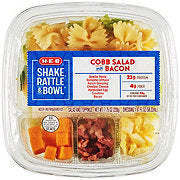 https://images.heb.com/is/image/HEBGrocery/prd-small/h-e-b-shake-rattle-bowl-cobb-salad-with-bacon-nbsp--001652749.jpg