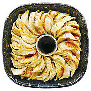 https://images.heb.com/is/image/HEBGrocery/prd-small/h-e-b-sushiya-pot-stickers-party-tray-001445241.jpg