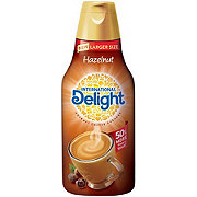 https://images.heb.com/is/image/HEBGrocery/prd-small/international-delight-hazelnut-liquid-coffee-creamer-001786640.jpg