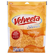 https://images.heb.com/is/image/HEBGrocery/prd-small/kraft-velveeta-shreds-cheddar-cheese-shredded-001727275.jpg