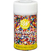 https://images.heb.com/is/image/HEBGrocery/prd-small/wilton-rainbow-nonpareils-sprinkles-000161718.jpg