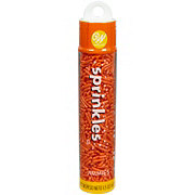 https://images.heb.com/is/image/HEBGrocery/prd-small/wilton-skinny-orange-jimmies-sprinkles-002264504.jpg